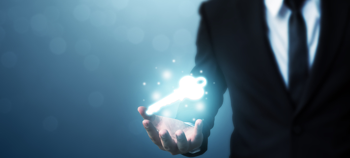 Businessman hand showing key to success. Problem solving to overcome work obstacles
